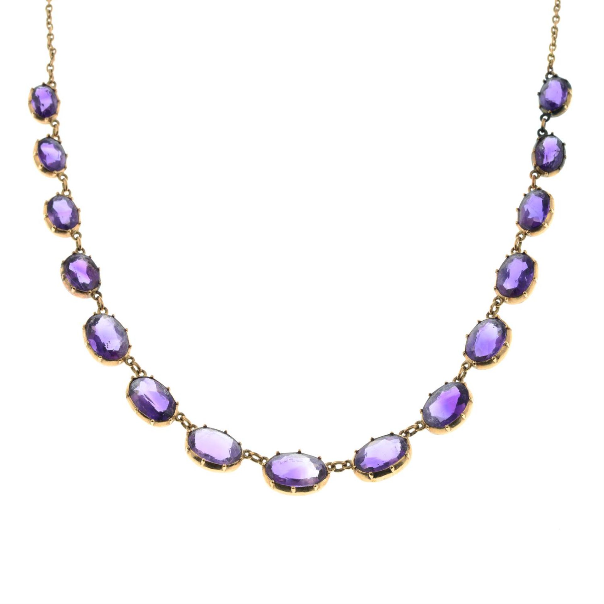 A 19th century gold graduated amethyst rivière necklace, with chain-link back-chain. - Image 2 of 4
