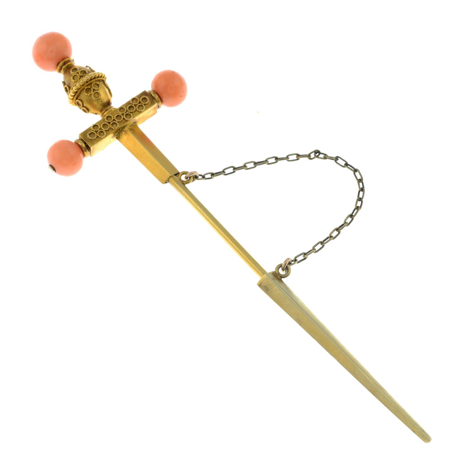 A mid to late 19th century gold cannetille sword pin, with coral bead highlights. - Image 2 of 4