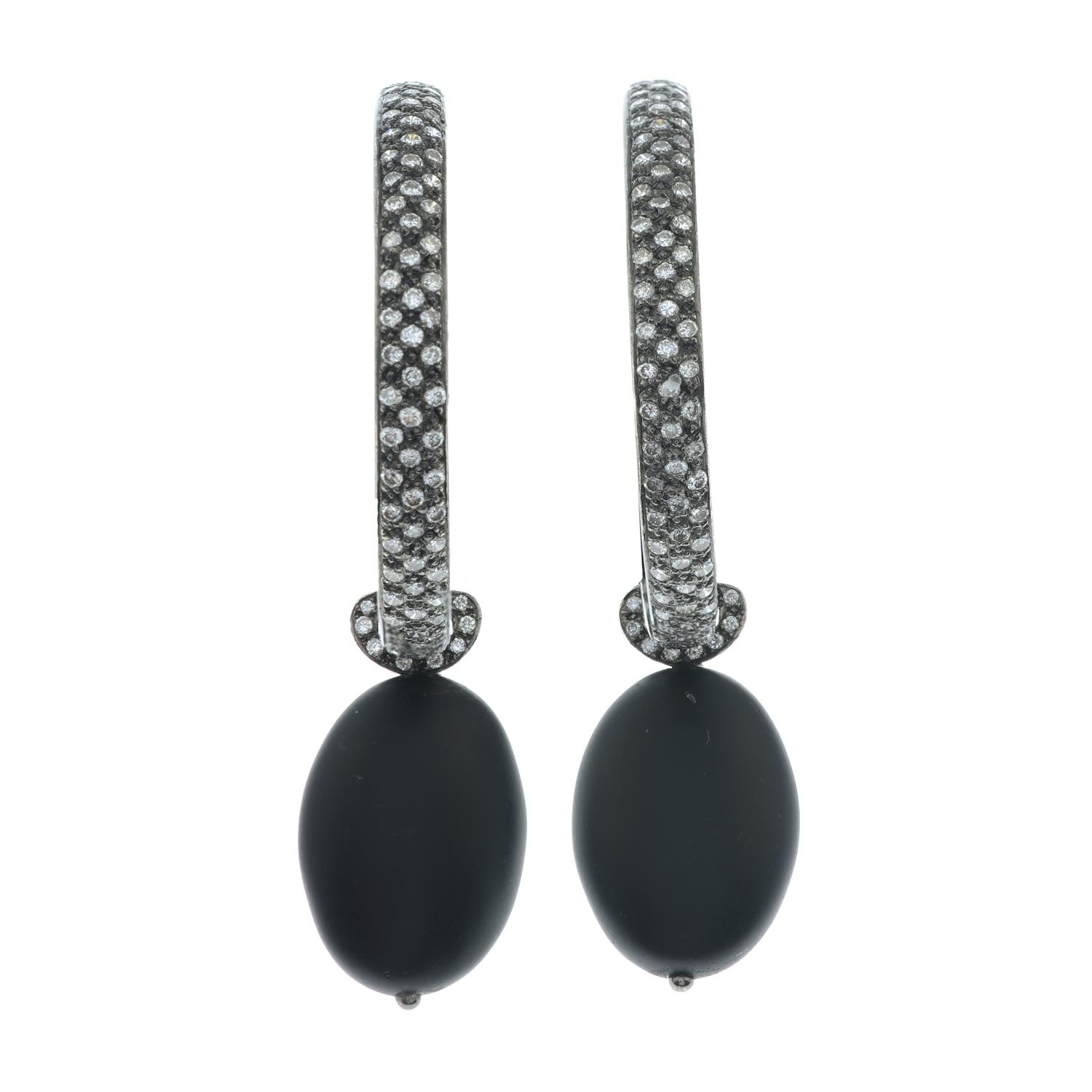 A pair of pavé-set diamond hoop earrings, with detachable black rubber and diamond drop. - Image 2 of 4