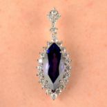 A tanzanite and brilliant-cut diamond cluster pendant.