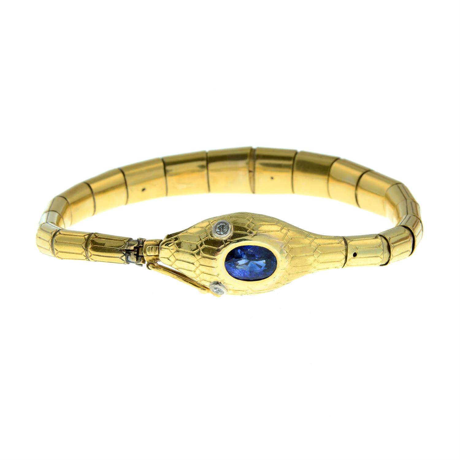 A 19th century gold snake bracelet, with sapphire crest and old-cut diamond eyes. - Image 2 of 4