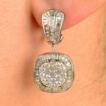 A pair of pavé-set vari-cut diamond drop earrings.