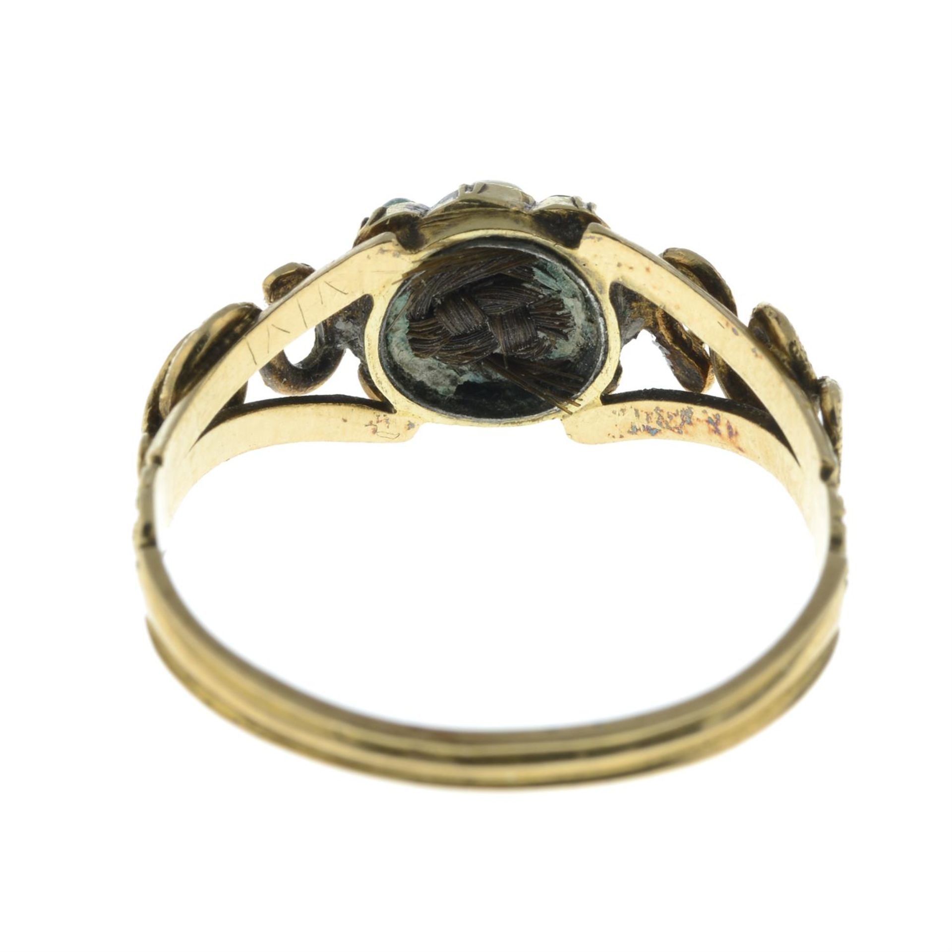 An early to mid 19th century gold emerald and split pearl mourning ring, with snake shoulders. - Image 4 of 5