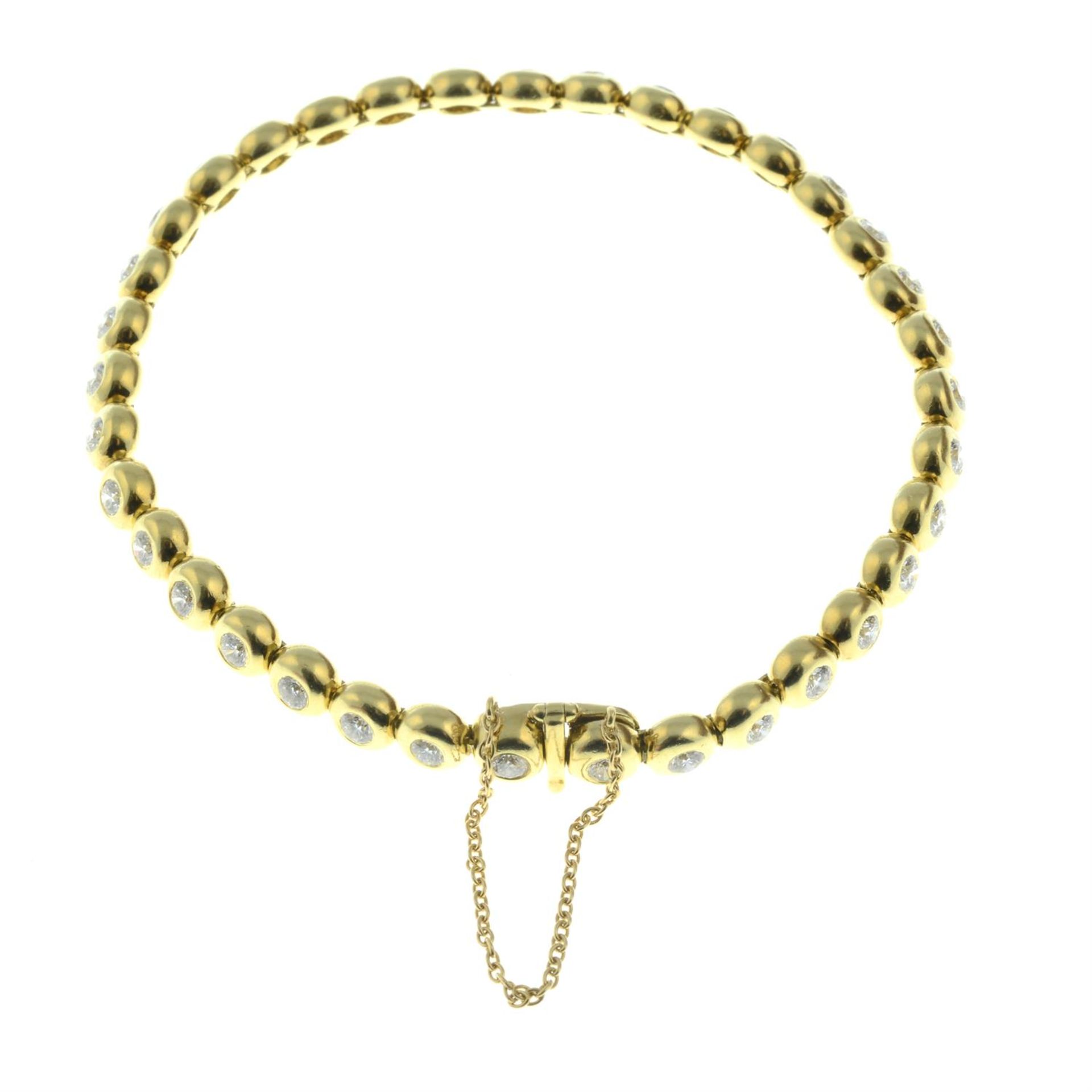 An 18ct gold brilliant-cut diamond collet bracelet, by Tiffany & Co. - Bild 3 aus 3