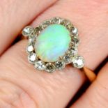 An early 20th century 18ct gold and platinum opal and single-cut diamond cluster ring.
