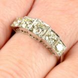 A brilliant-cut diamond five-stone ring.