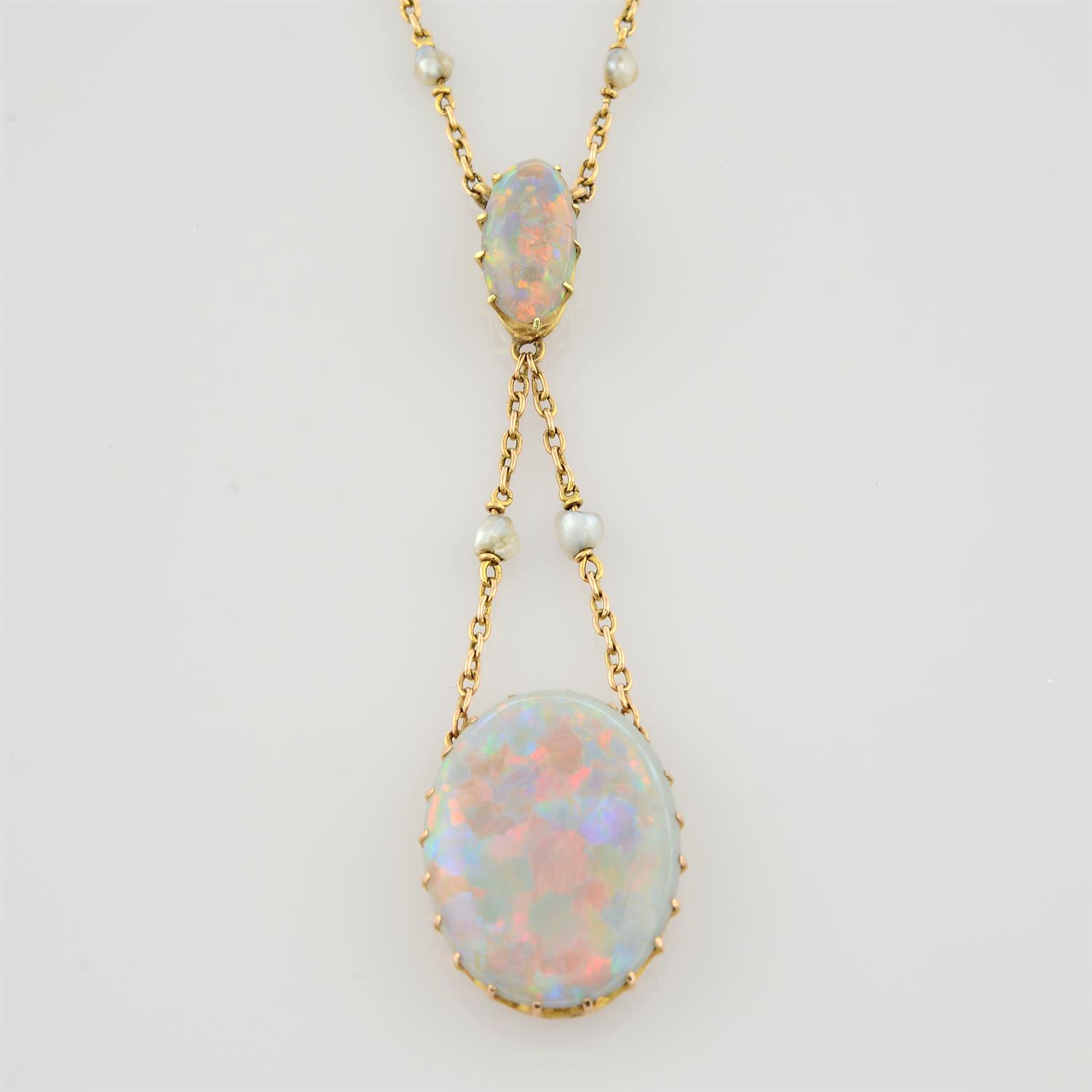 An early 20th century 14ct gold opal necklace, with seed pearl spacer trace-link chain. - Image 2 of 5