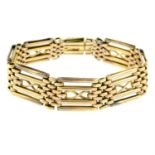 An early 20th century 9ct gold gate-link bracelet.