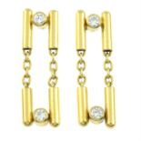 A pair of diamond accent drop earrings.