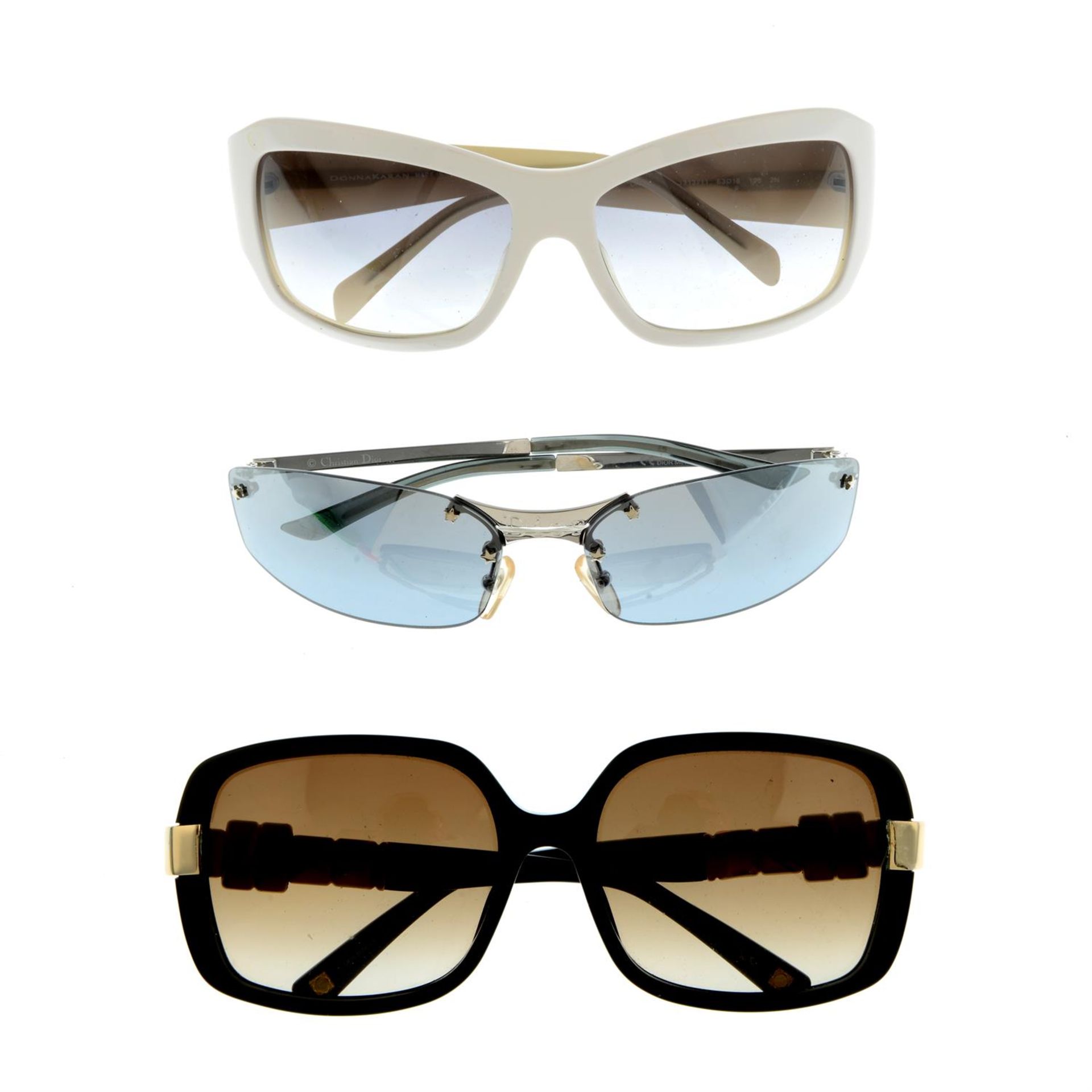 Three pairs of designer sunglasses.