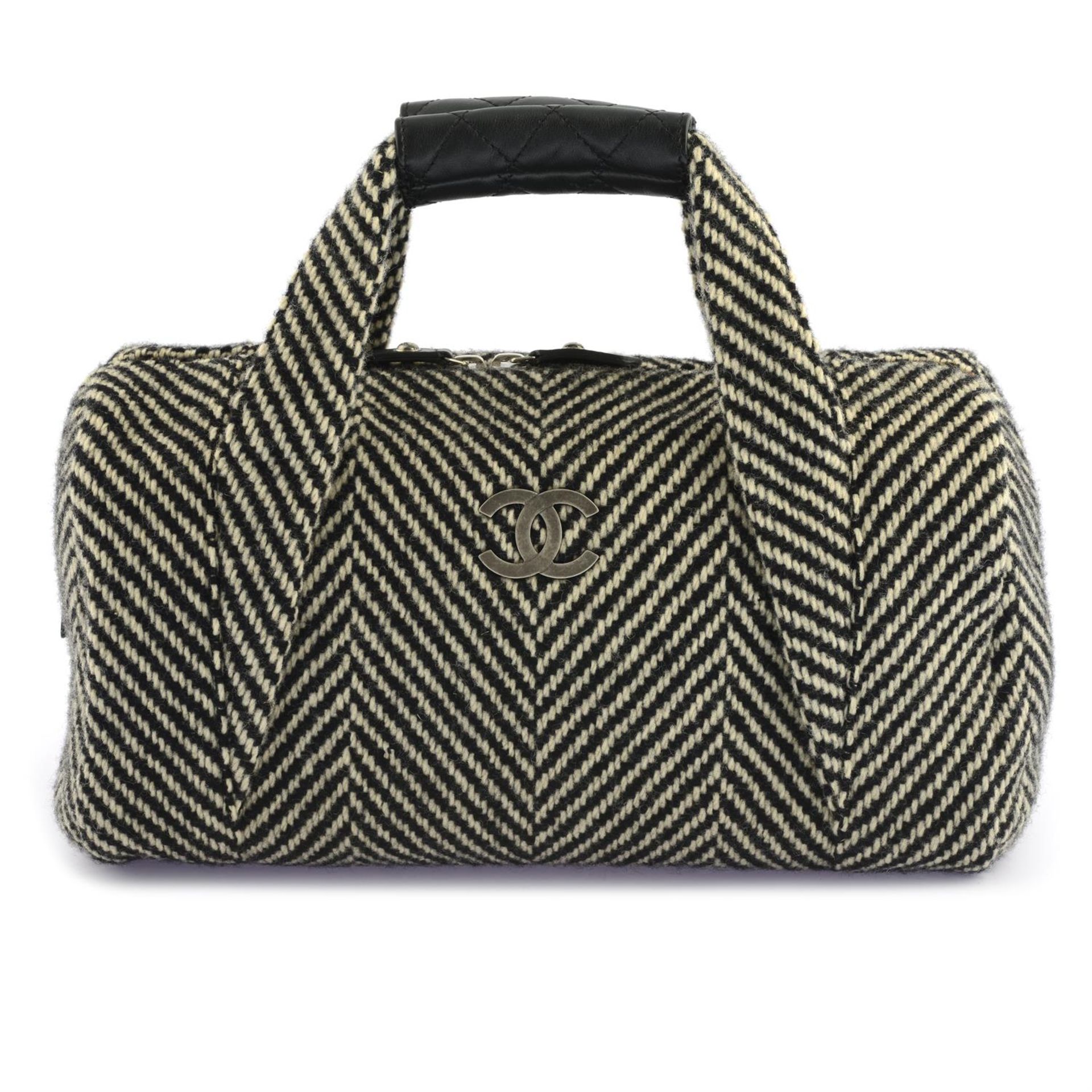 CHANEL - a chevron woven fabric handbag.