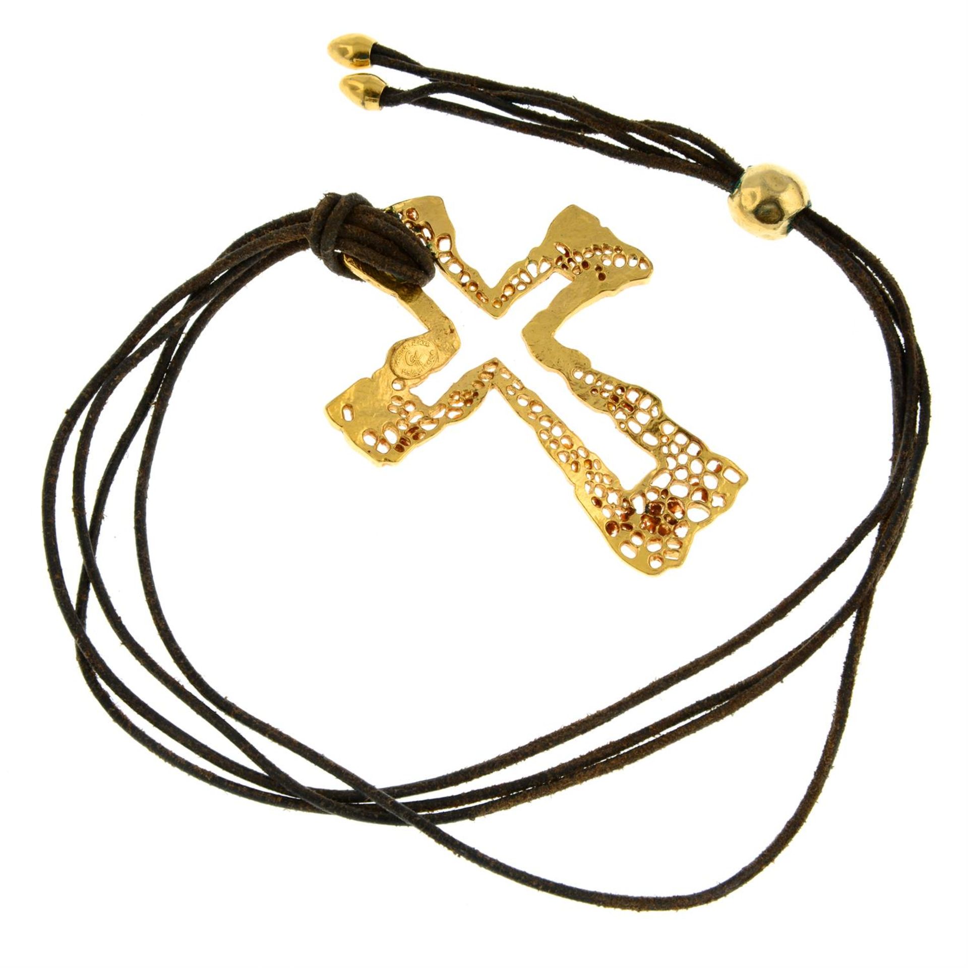 CHRISTIAN LACROIX - a cross pendant on leather cord. - Image 2 of 2