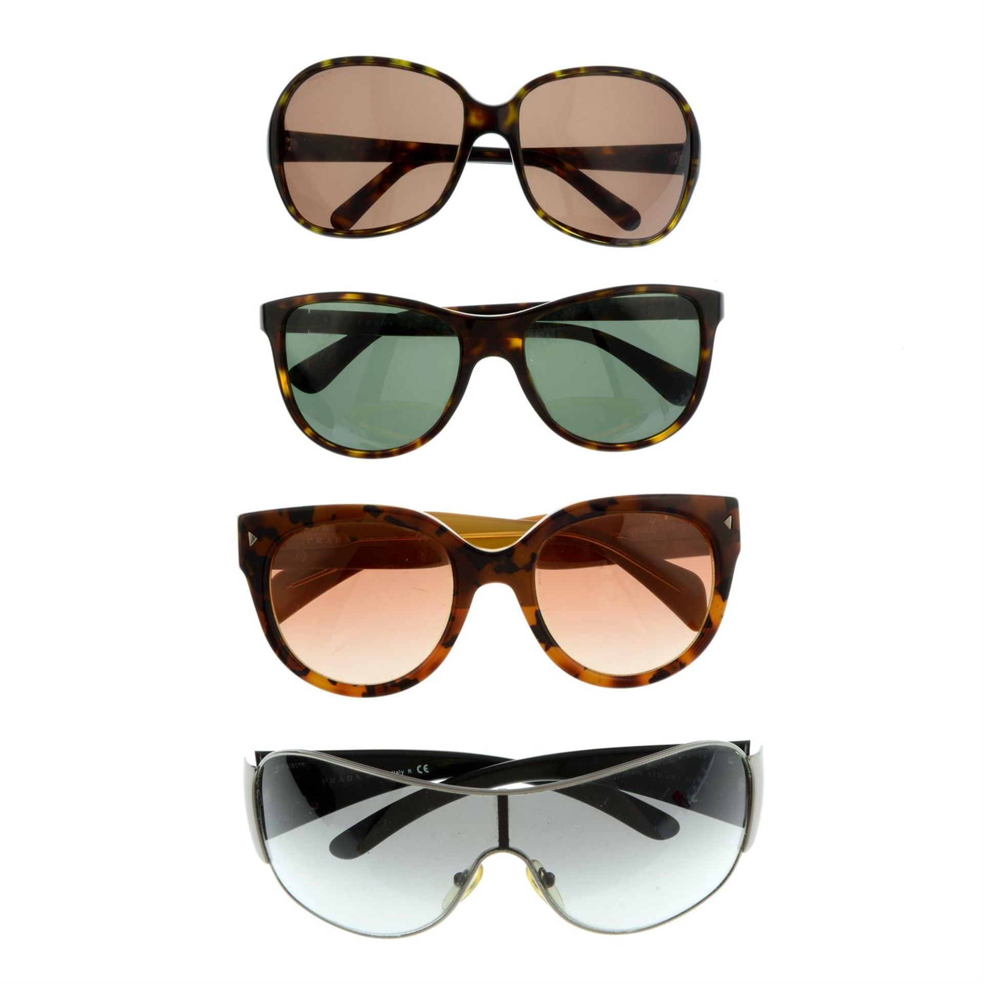 PRADA - four pairs of sunglasses.