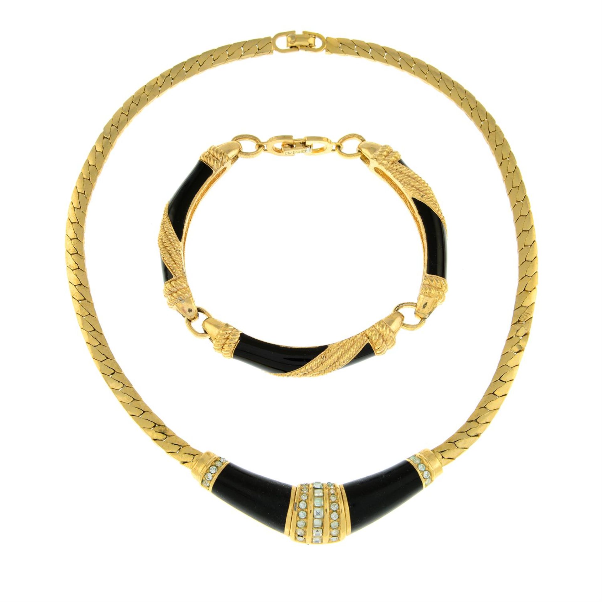 CHRISTIAN DIOR - a black enamel and paste set necklace, together with a similar bracelet.