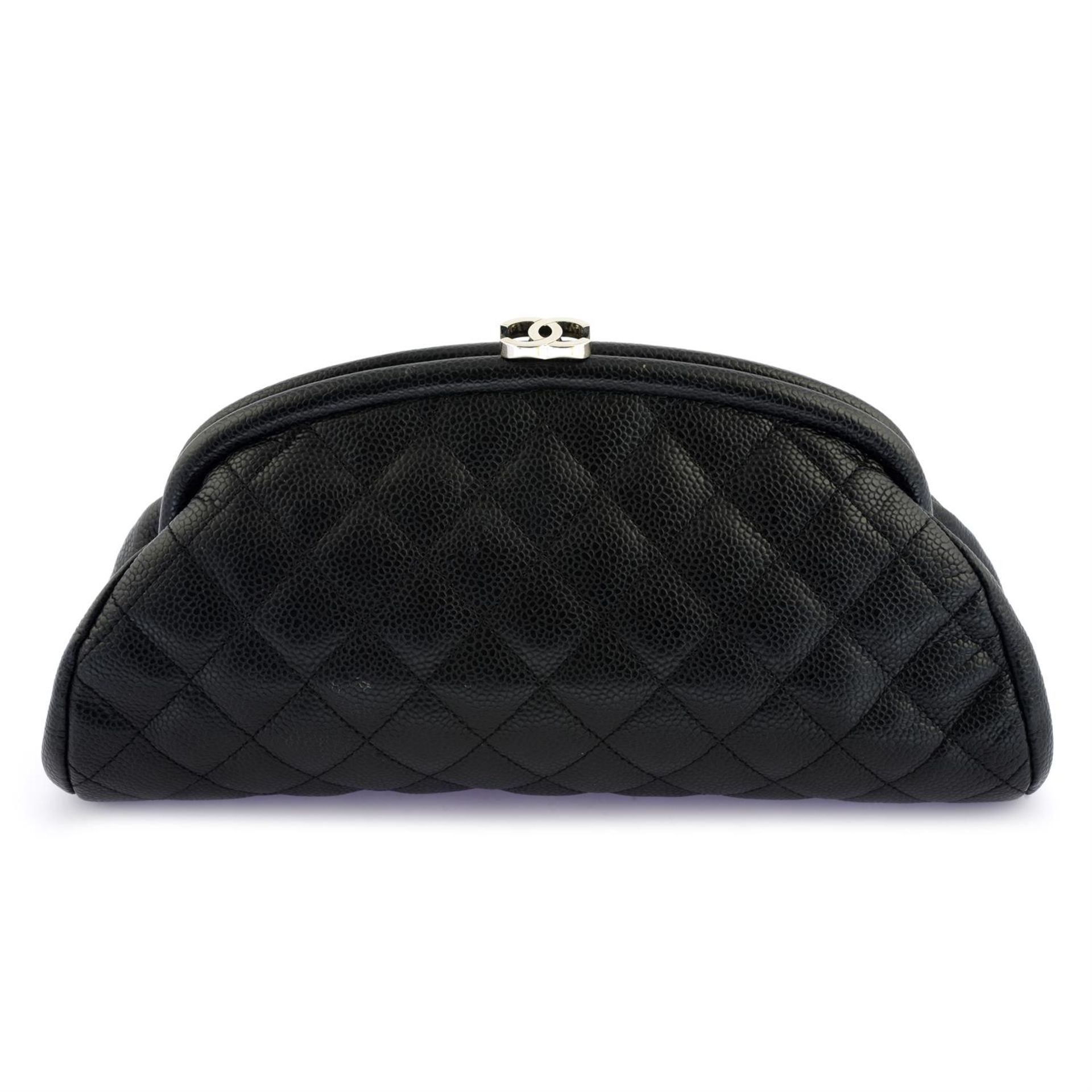 CHANEL - a black Caviar leather Mademoiselle Timeless Clutch.