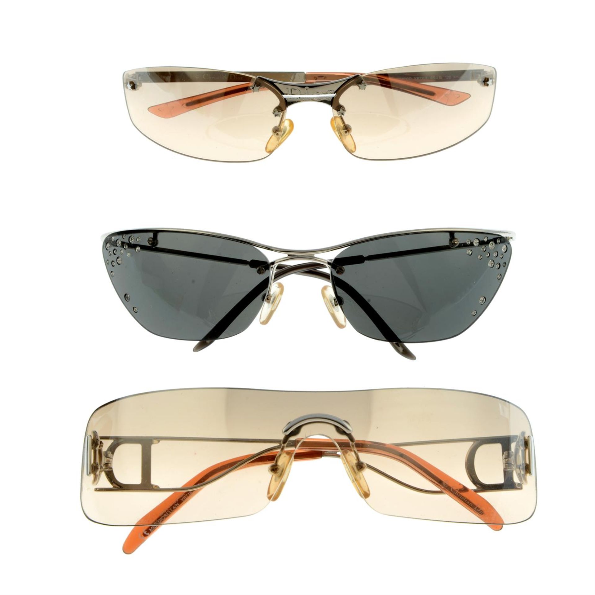 CHRISTIAN DIOR - three pairs of sunglasses.