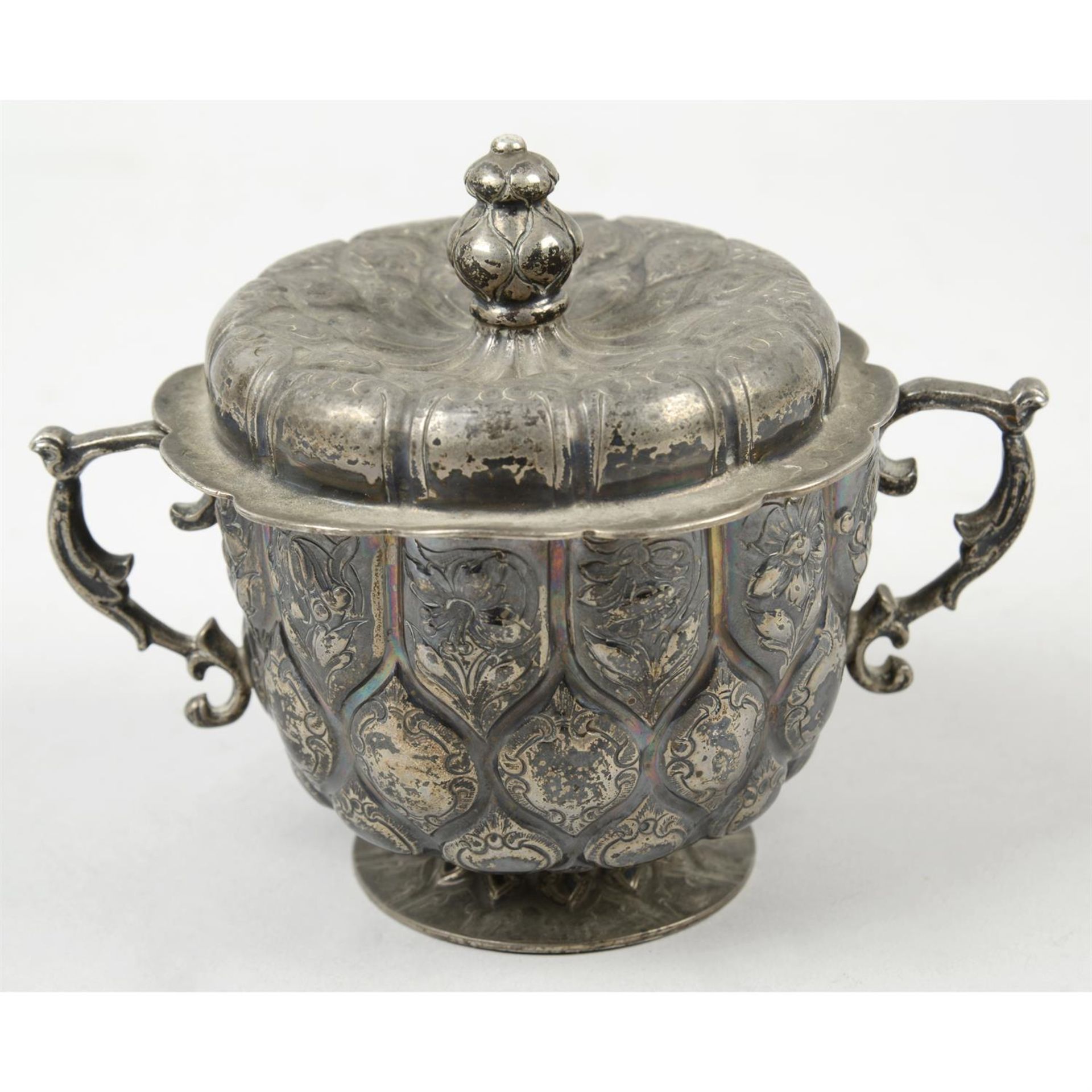 A silver twin-handled cup and cover.