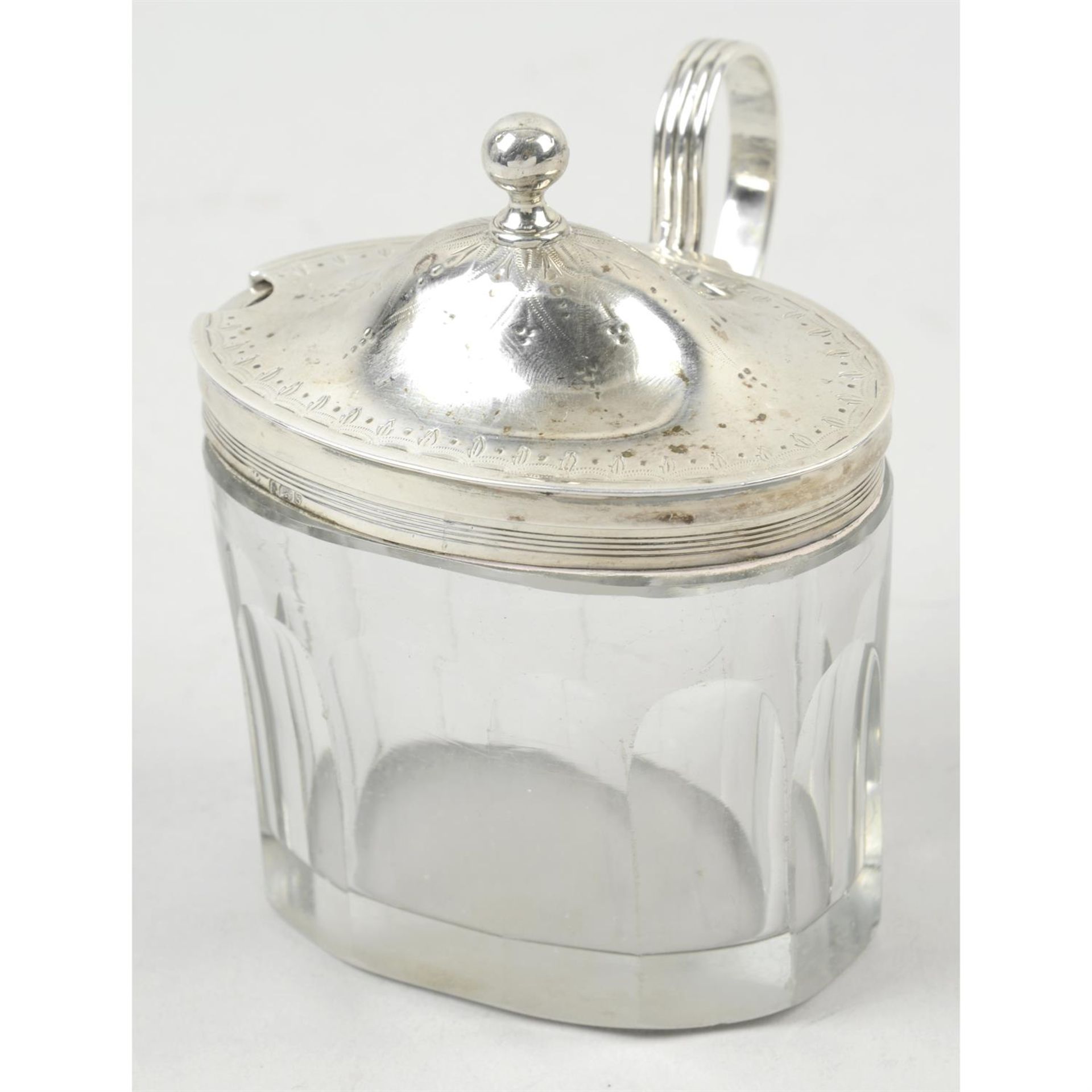 A George III silver mounted & glass mustard pot.