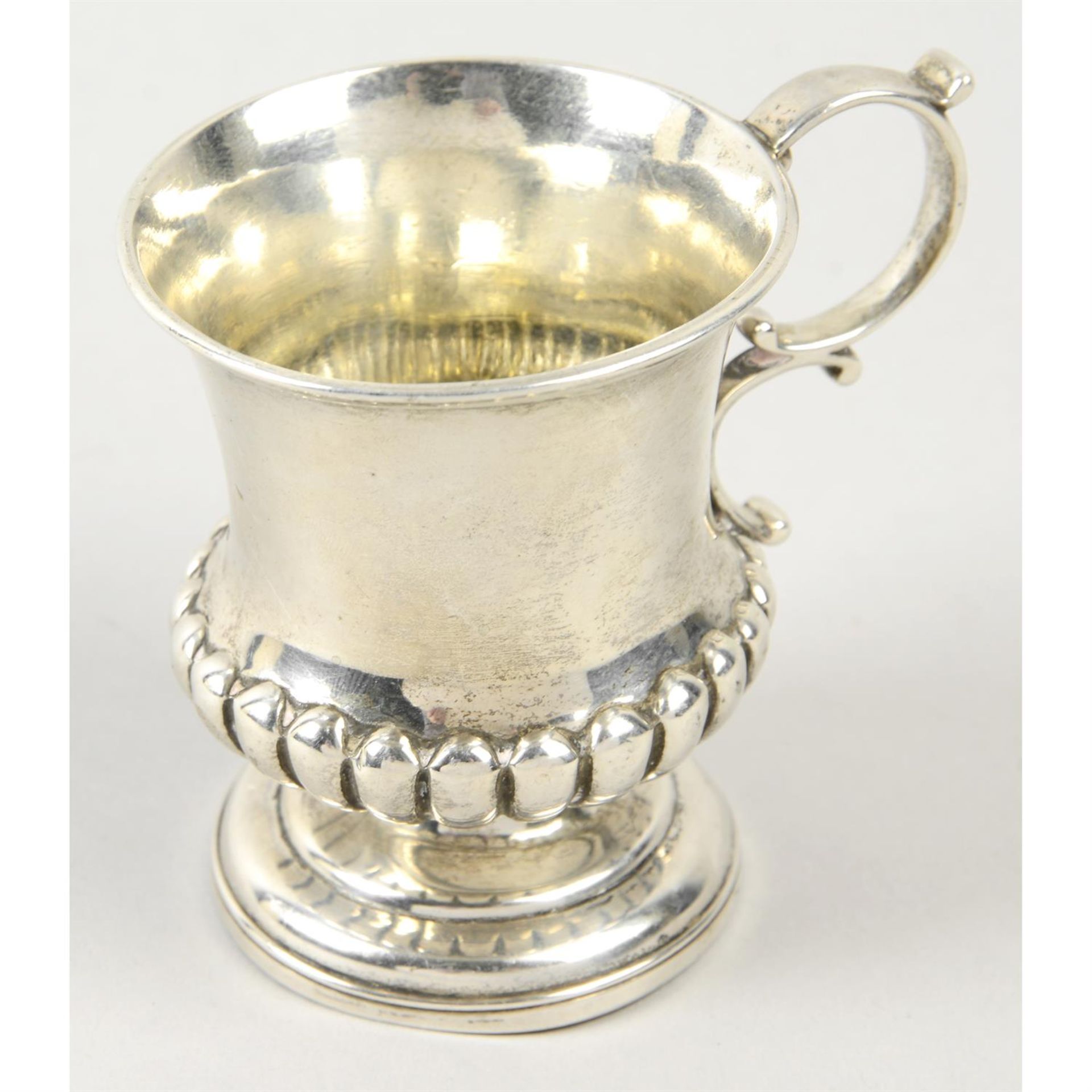 A William IV silver christening cup.
