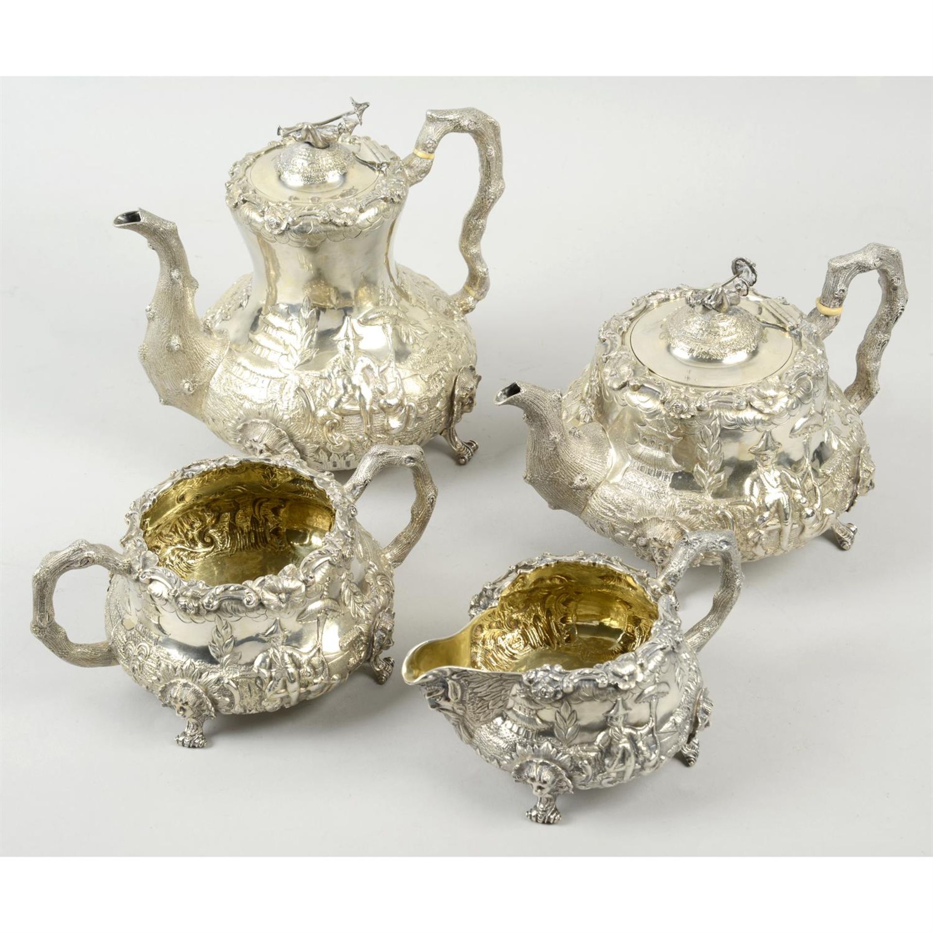 An impressive early Victorian silver Chinoiserie tea and coffee service.