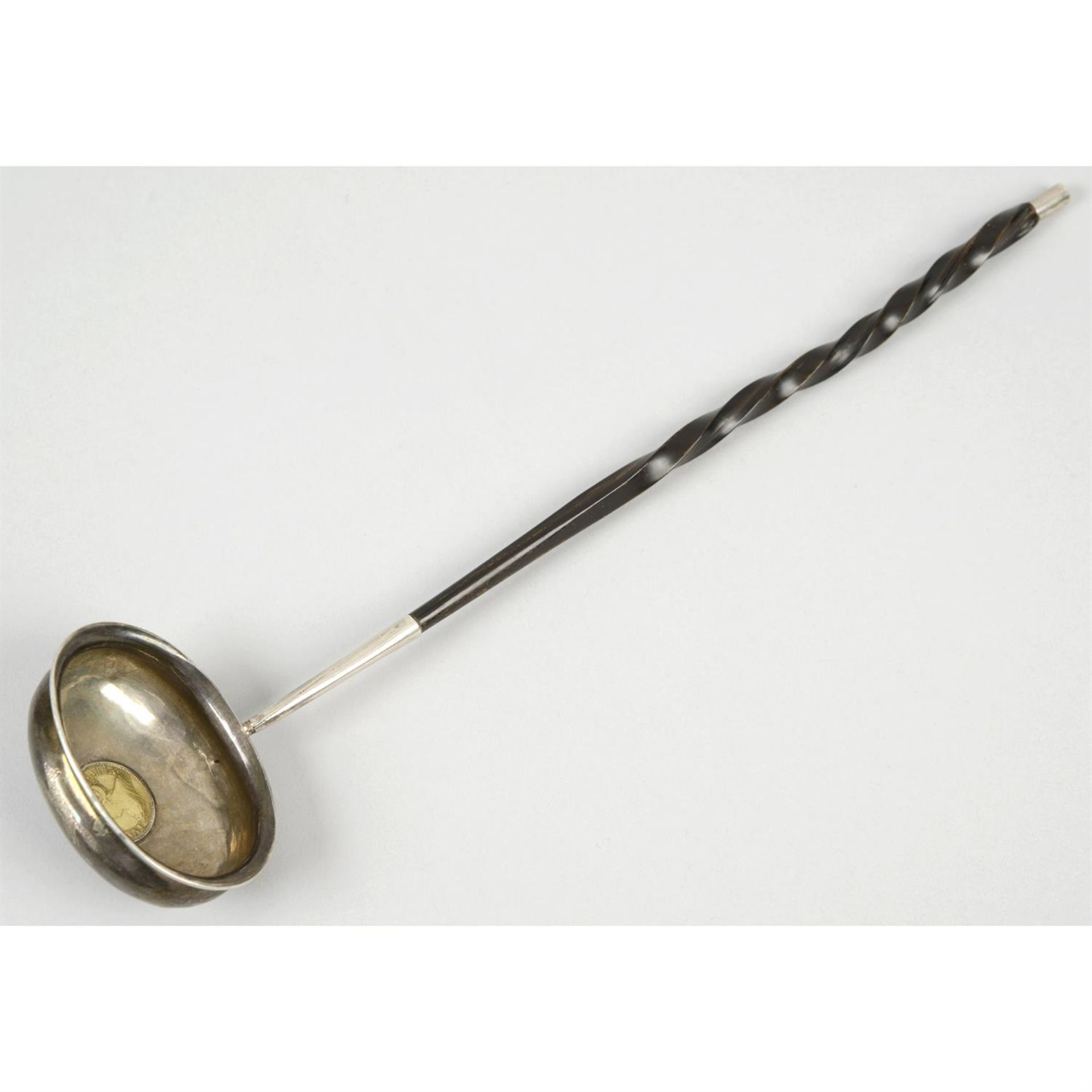 A punch ladle with inset coin, Queen Anne Half-Guinea.