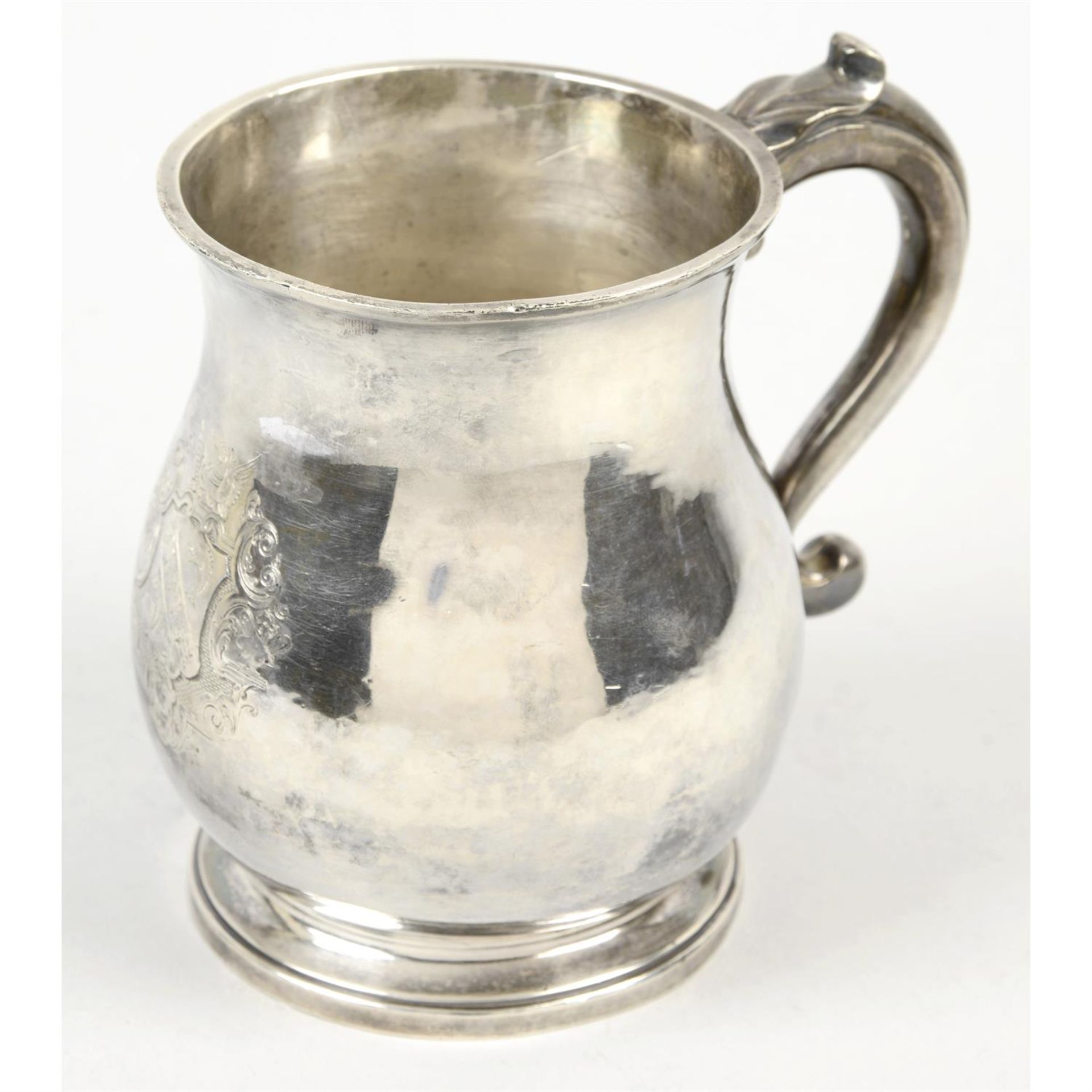 A George I Britannia silver baluster mug.