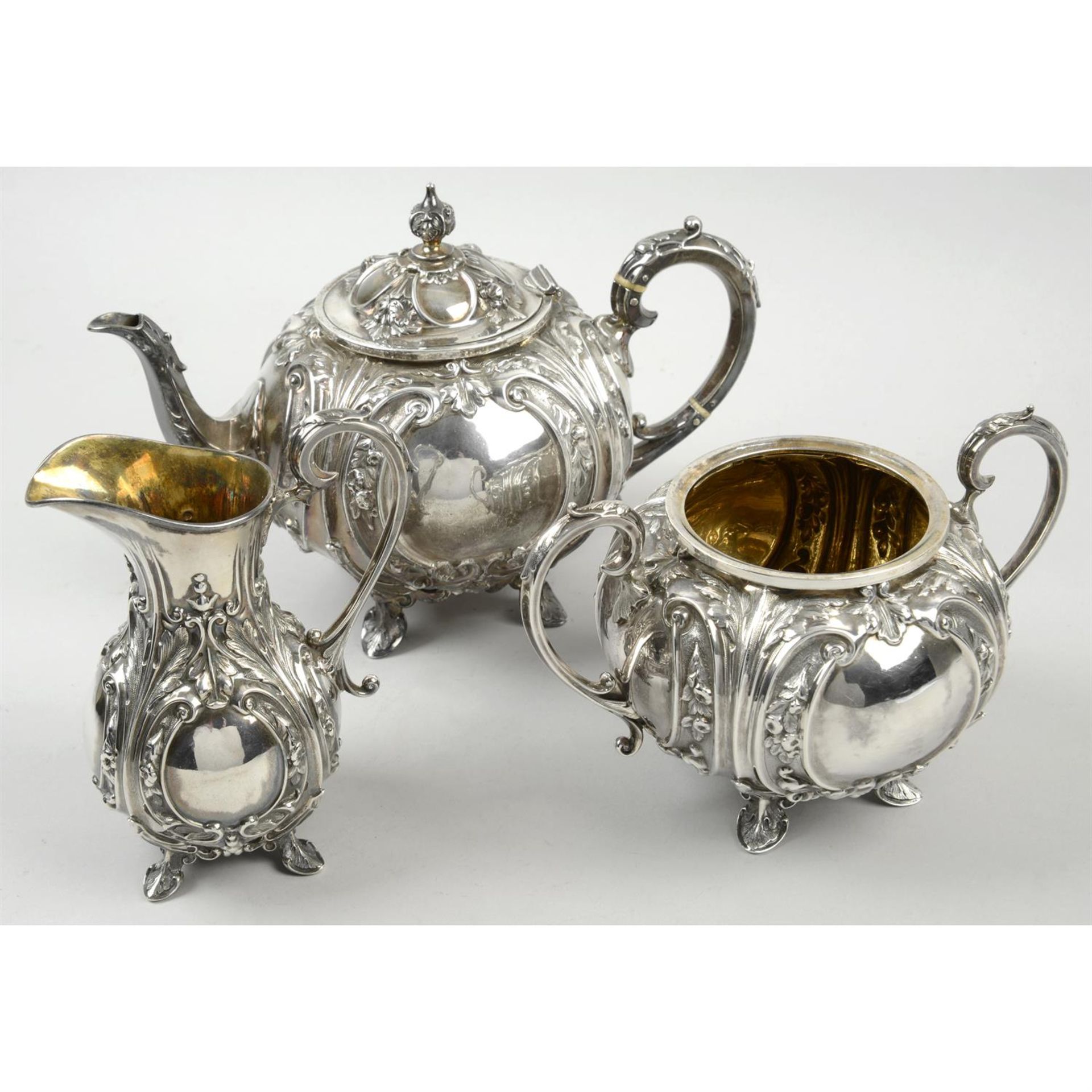 A mid-Victorian silver three piece part tea set.