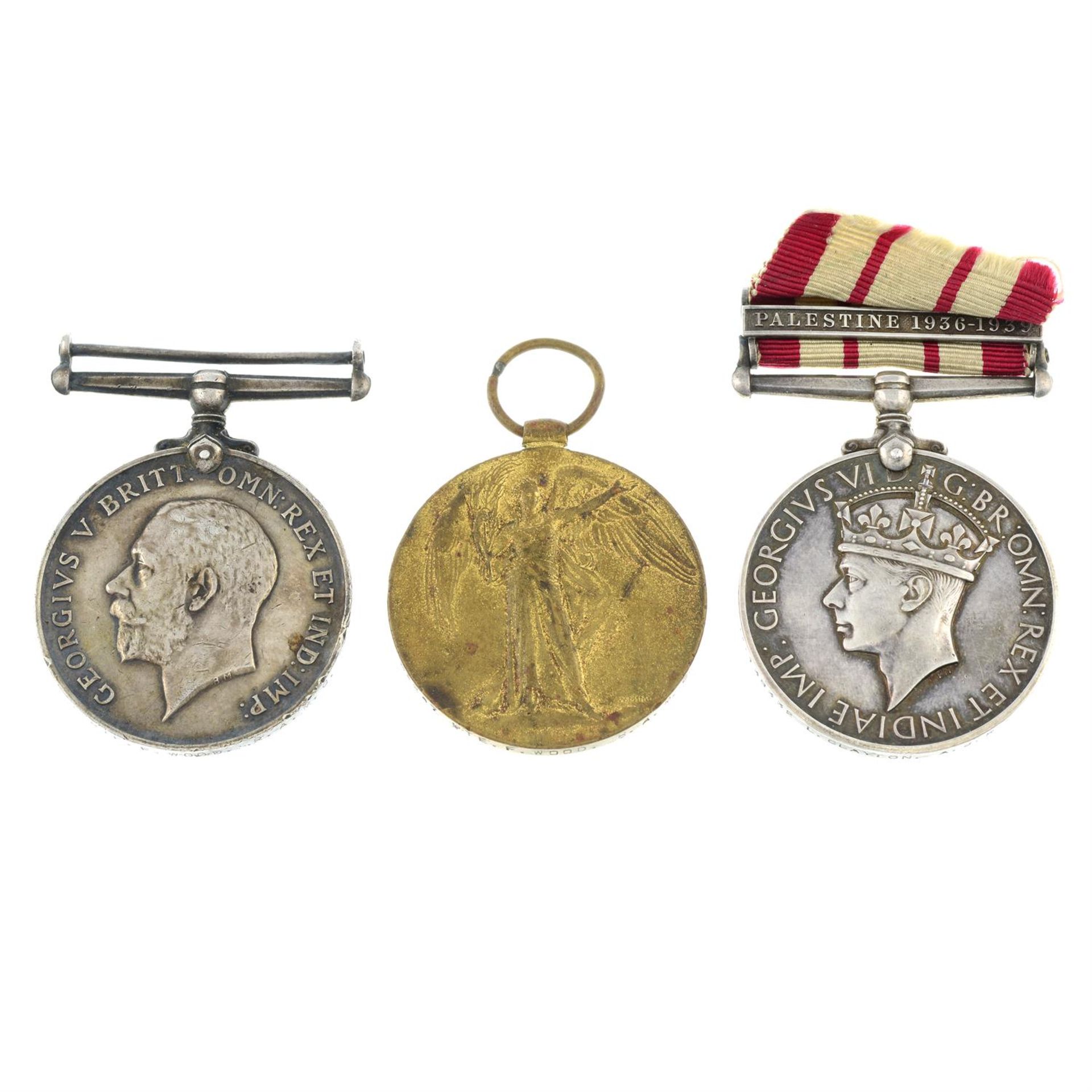 A selection of medals to include a Great War Pair, a Naval General Service Medal 1909-62,