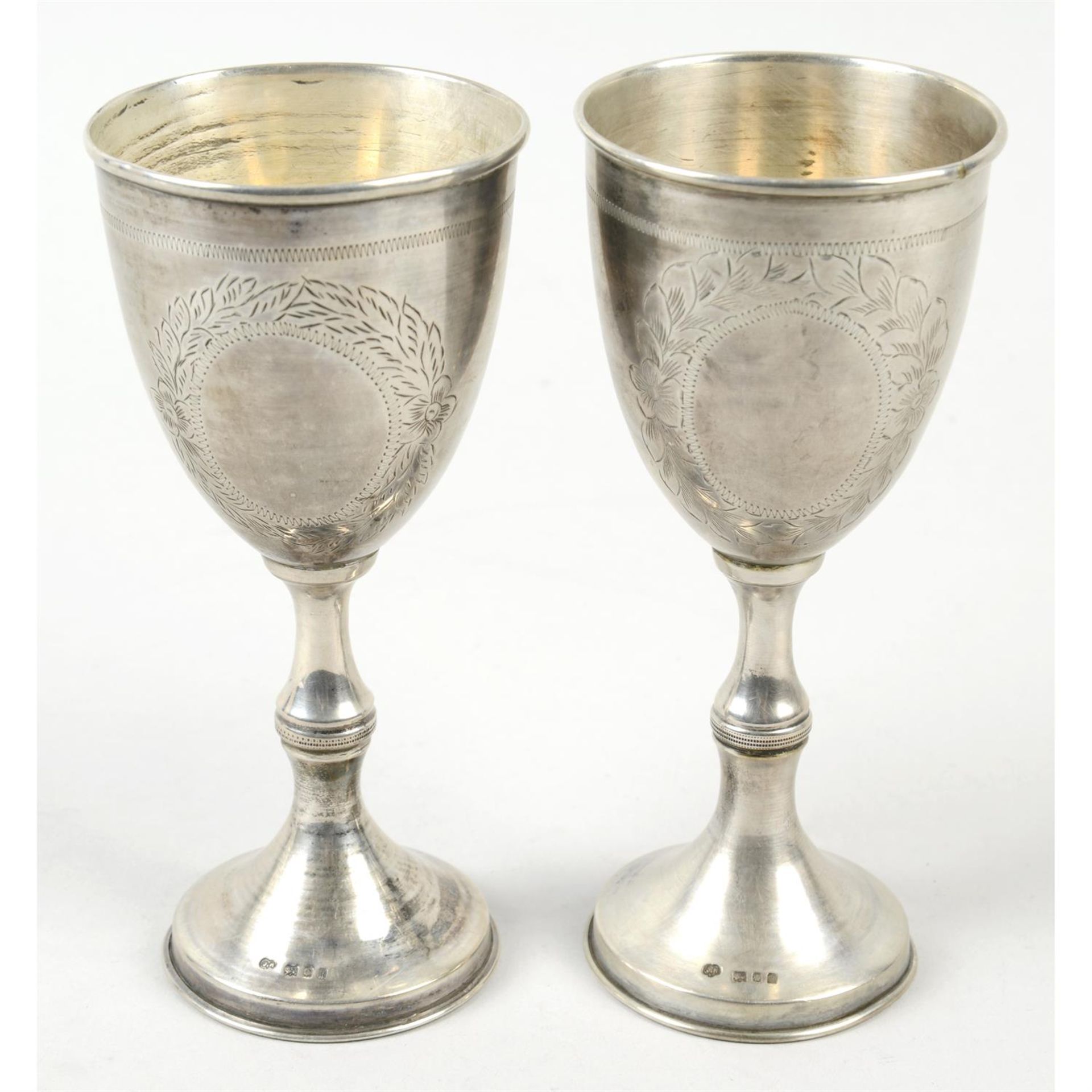 Judaica, two similar 1920's silver goblets.