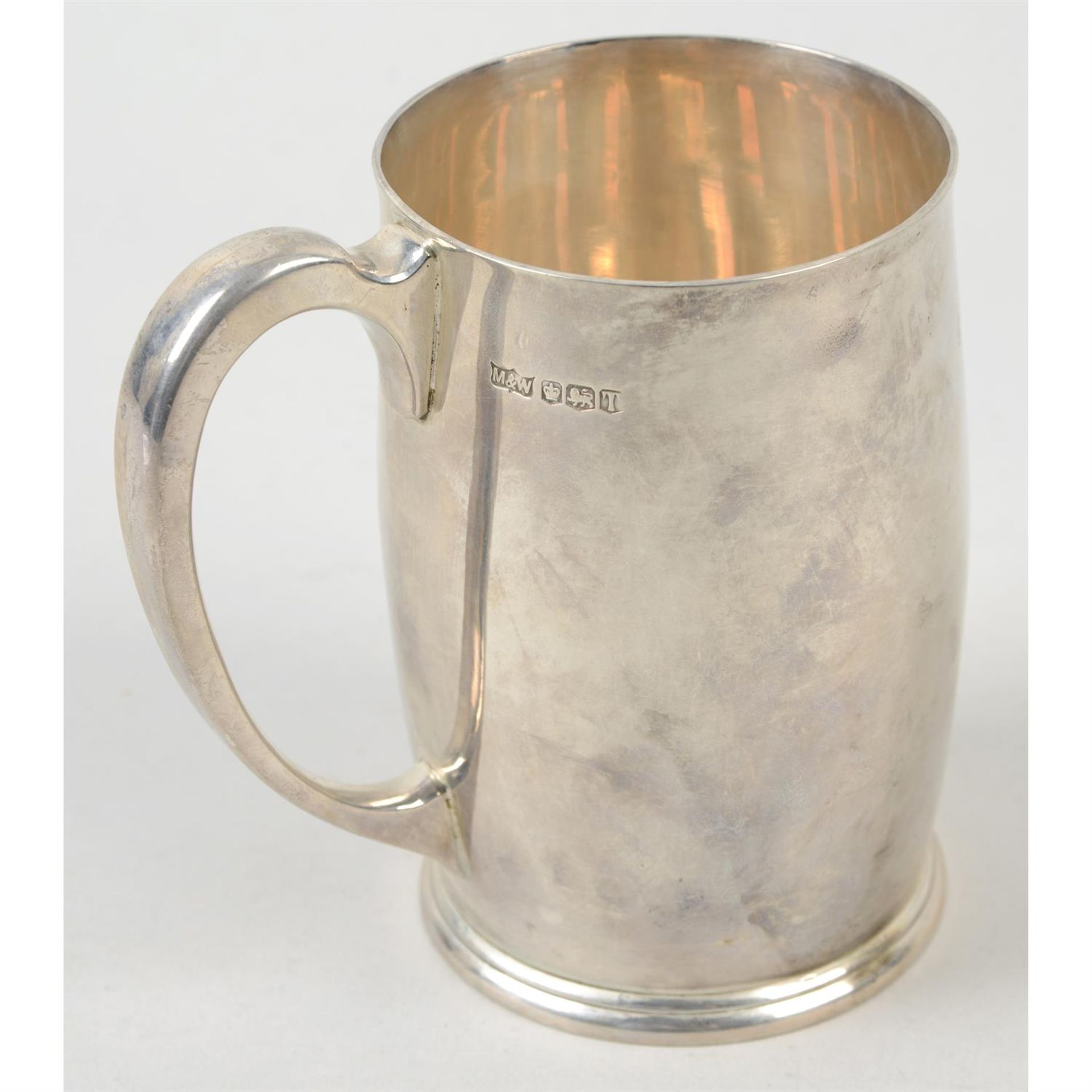 A mid-20th century silver pint mug with dolphin engraving, by Mappin & Webb. - Image 2 of 3