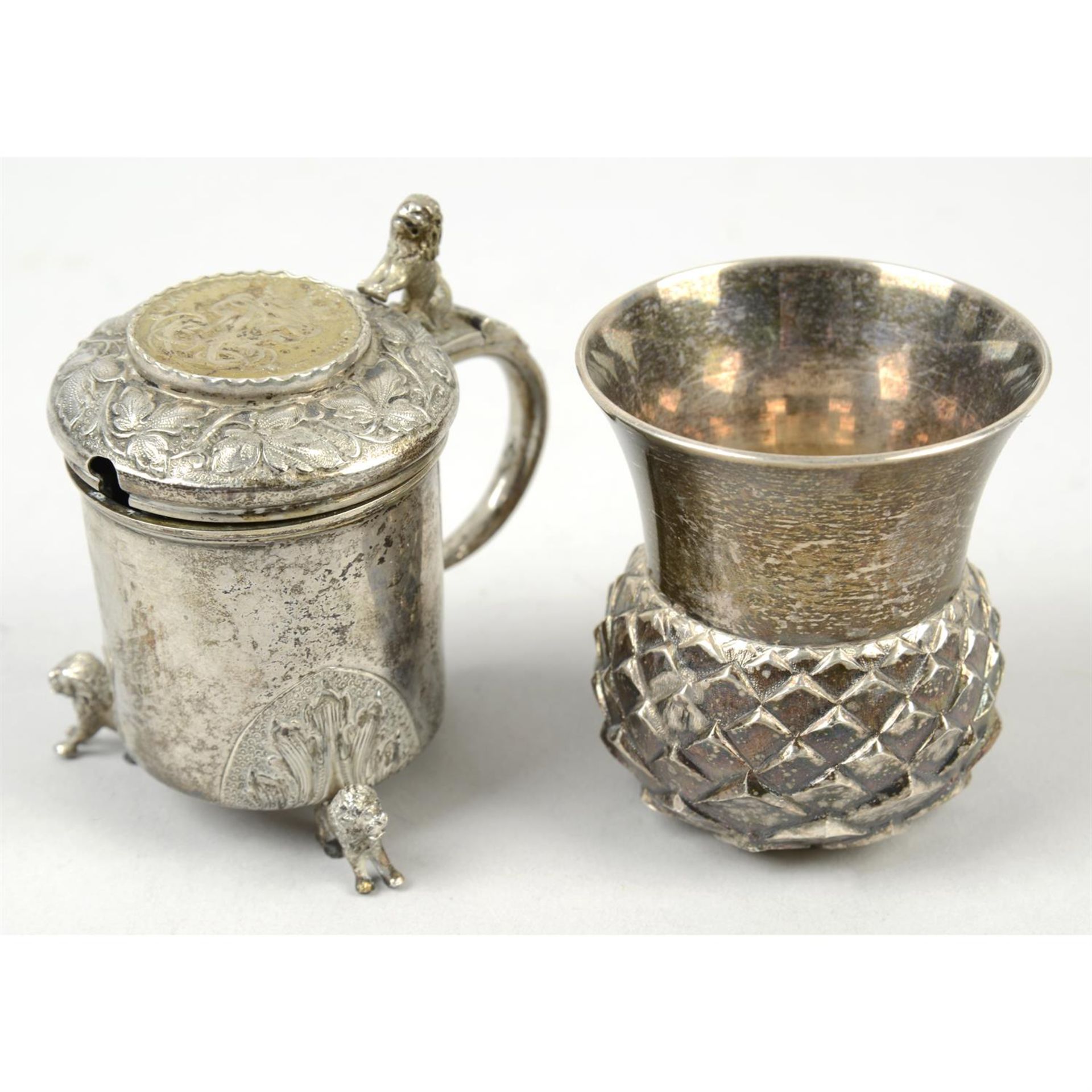 A modern Scottish silver small thistle shape vase; together with a Norwegian mustard pot. (2).