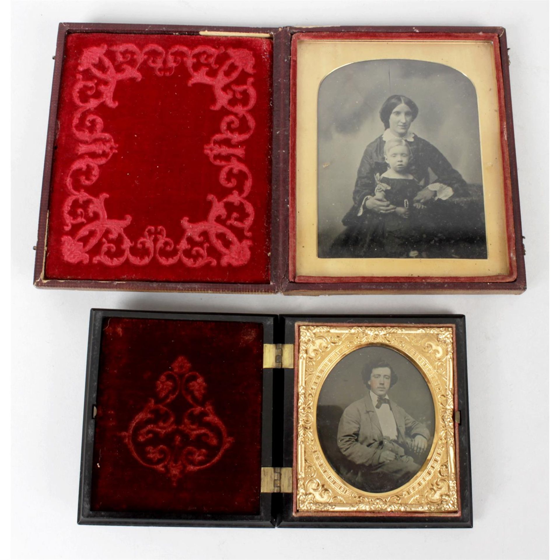 Two 19th century hinge cased photographs.
