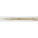 A Sampson Mordan & Co gold slide action telescopic propelling pencil.