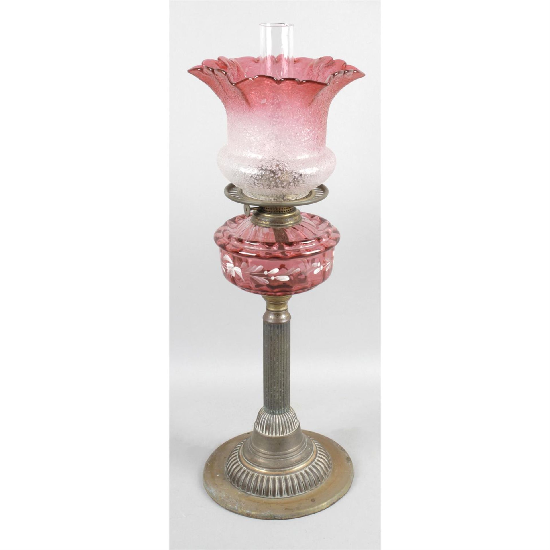 A Victorian oil lamp.