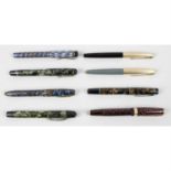 A collection of thirteen assorted vintage pens.