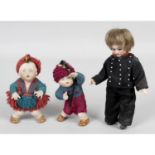 A pair of Heubach miniature dolls, together with a small selection of other miniature dolls.