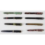 A collection of fifteen assorted vintage pens.