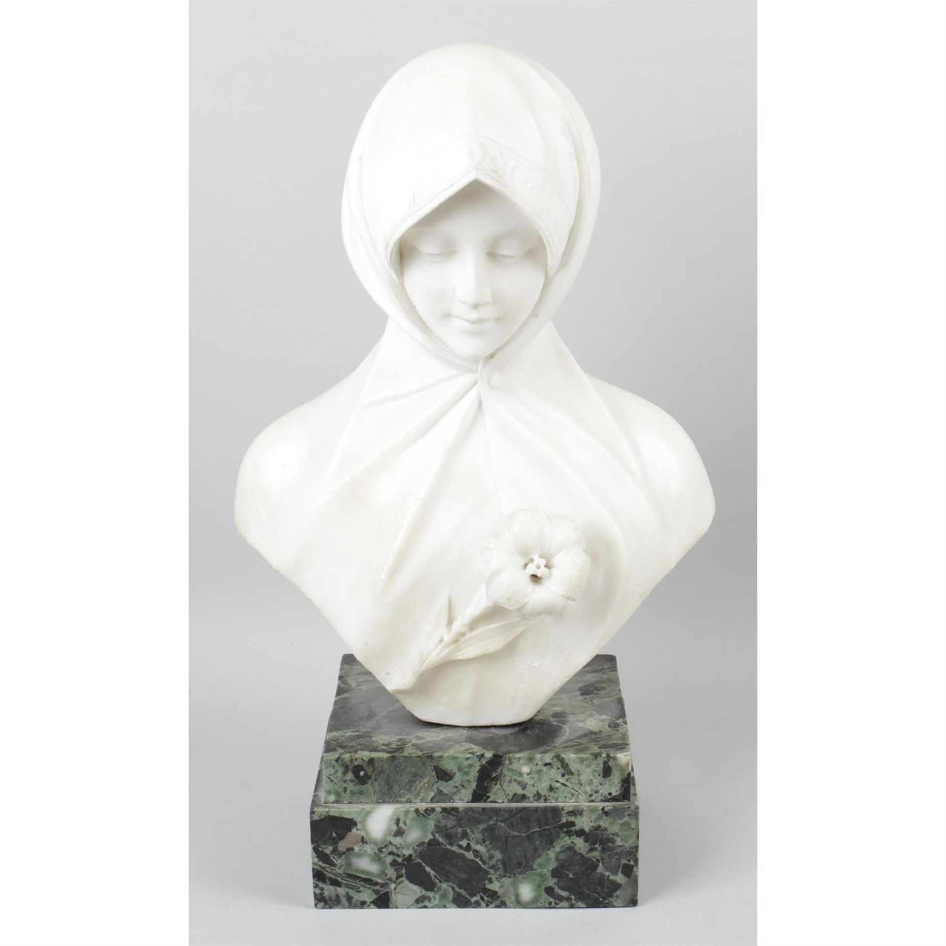 An Art Nouveau alabaster head and shoulder bust of pretty young maiden.