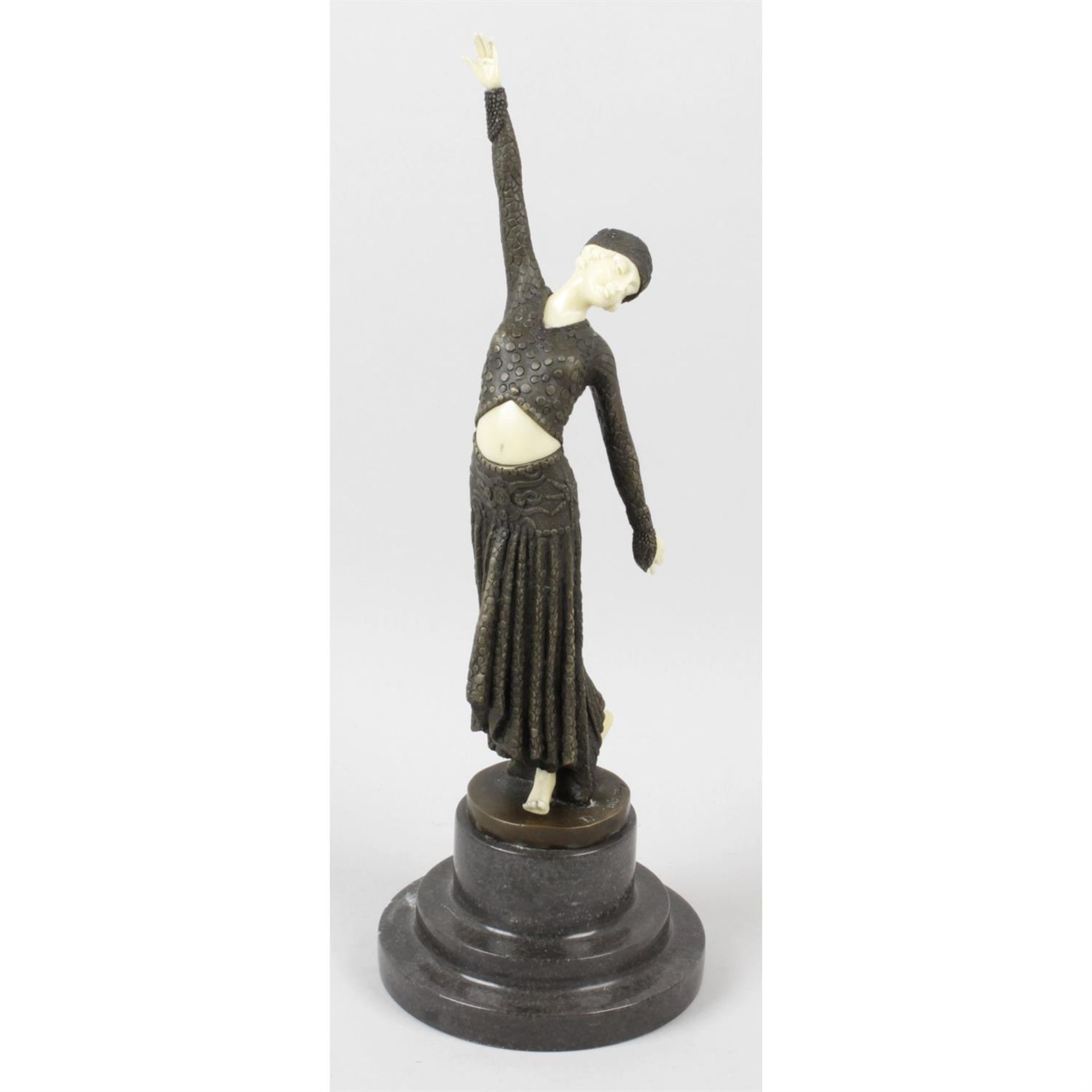 A reproduction bronze and resin figure modelled as a lady upon base.