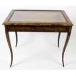 An antique tortoiseshell veneered bijouterie cabinet.