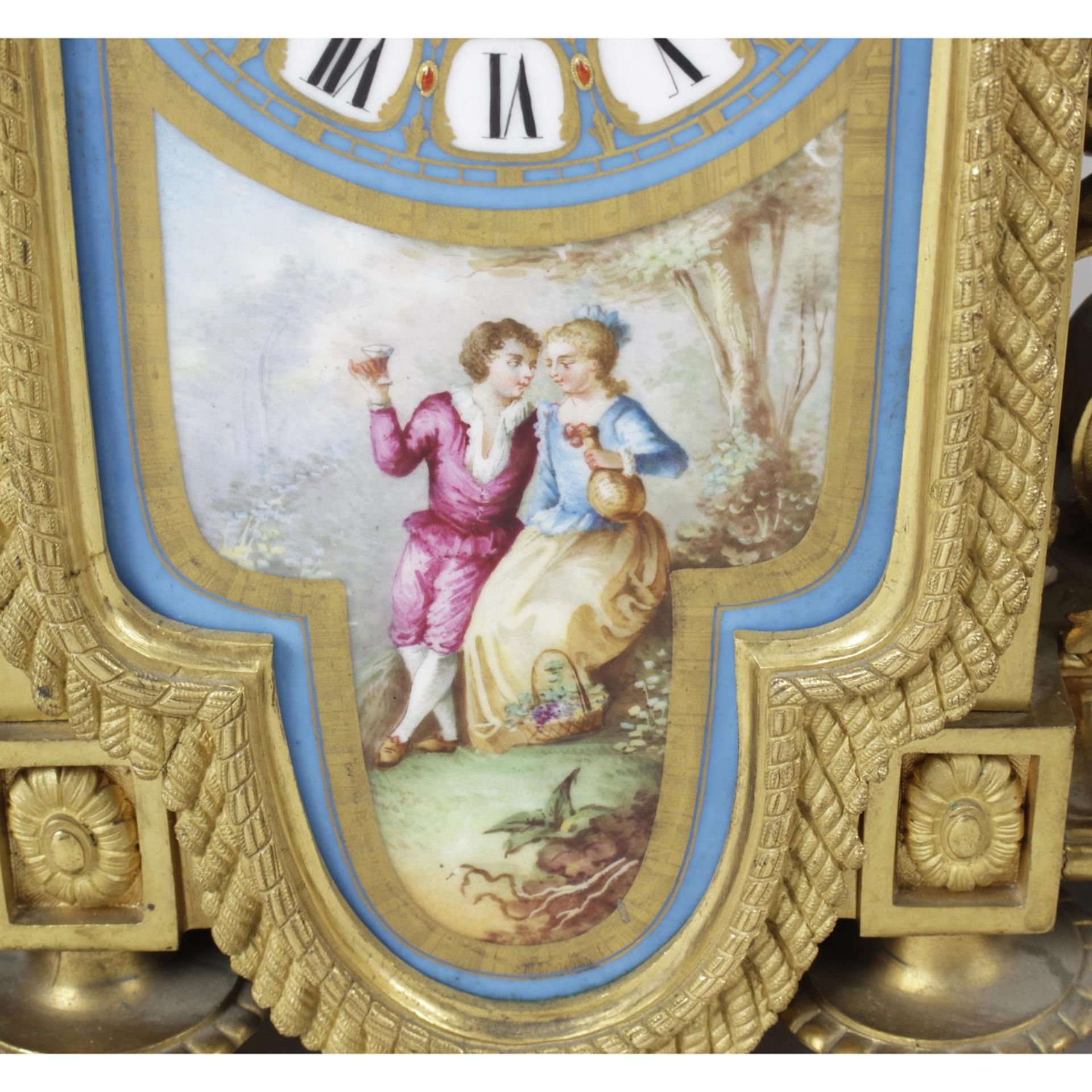 A 19th century French gilt bronze and porcelain panel inset clock garniture, together with a pair - Image 2 of 3