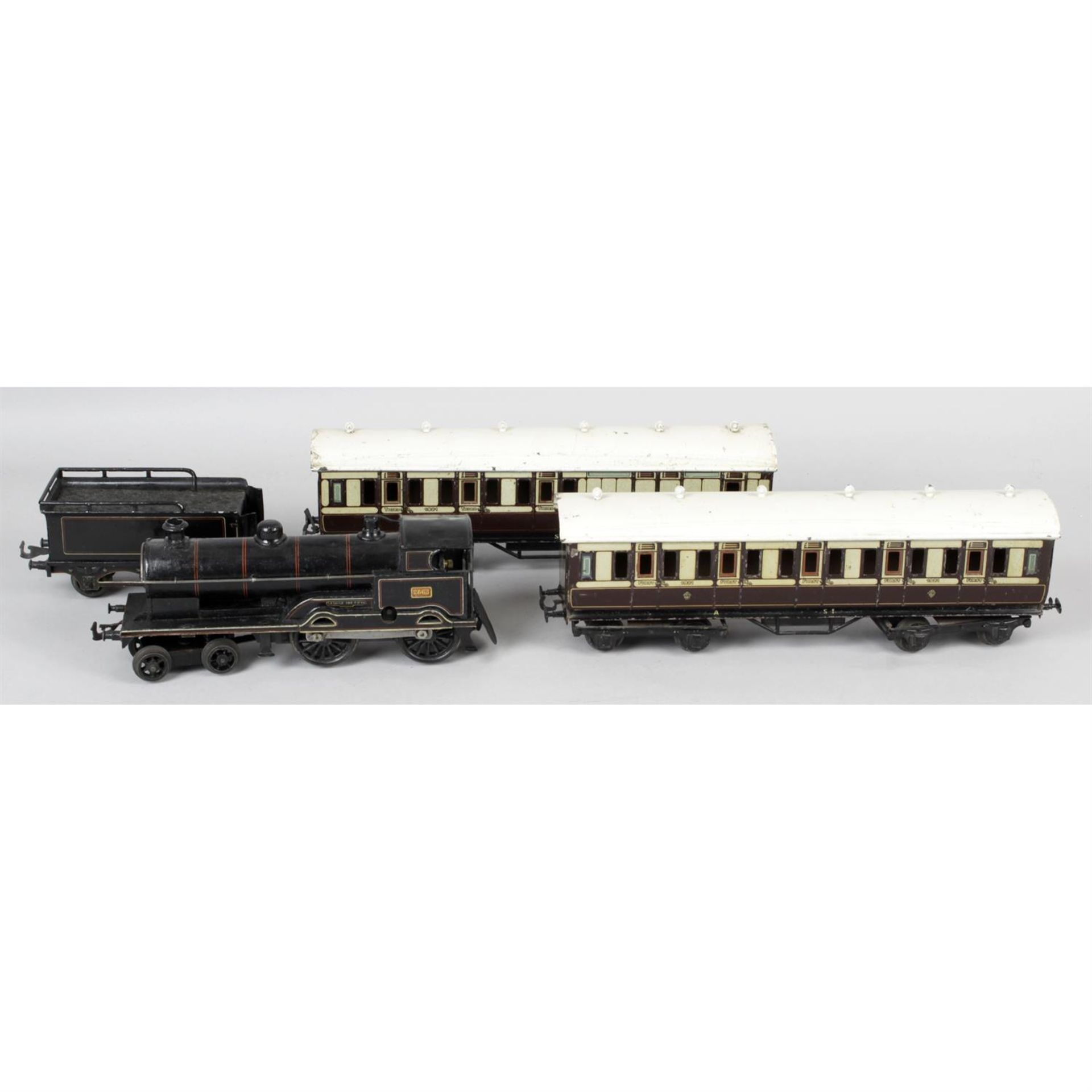 A Bing O Gauge model 'George the Fifth' locomotive and tender, together with two similar coaches,