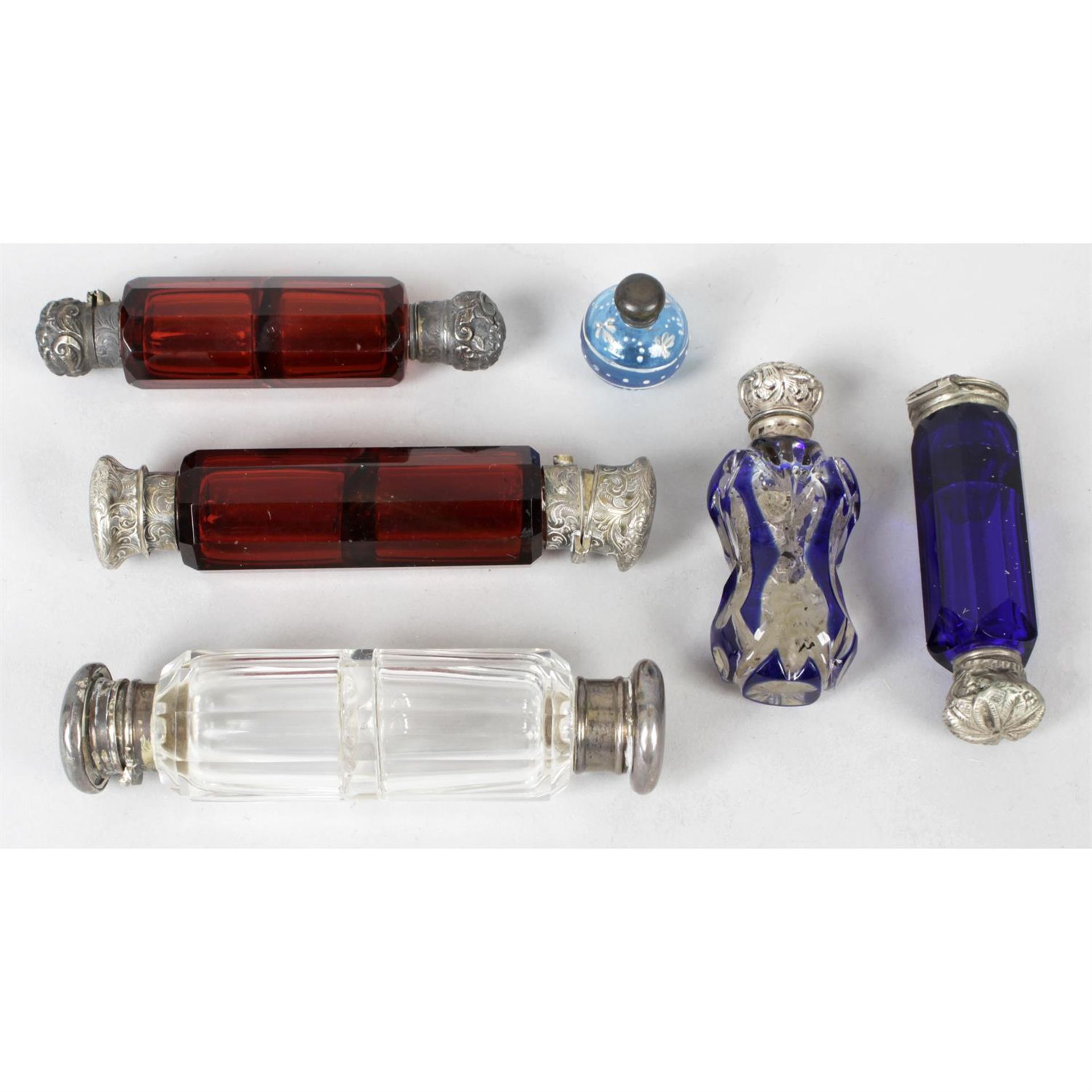 A small mixed selection of assorted scent bottles.