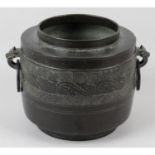 A Chinese pattinated bronze vessel.