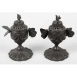 A pair of 19th century bronze pastille burners.