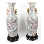 A pair of impressive, large mid-19th century Cantonese porcelain vases.