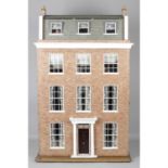 A large wooden dolls house.