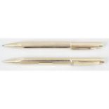 An Eversharp propelling pencil, together with a similar twist action propelling pen.