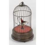 A reproduction 20th century reproduction singing bird automata.