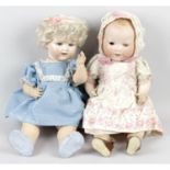 Two Armand Marseille bisque headed dolls, together with two other dolls. (4)